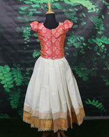 Coral pink brocade top with kerala kasavu set