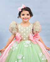 Sage Green Gown with White Flower Applique Detailing & Blush Pink Long Bow