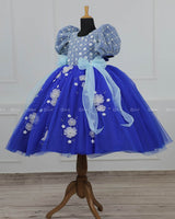 Royal Blue Gown with White Flower Applique Detailing & Light Blue Long Bow