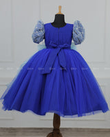 Royal Blue Gown with White Flower Applique Detailing & Light Blue Long Bow
