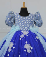 Royal Blue Gown with White Flower Applique Detailing & Light Blue Long Bow