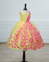Yellow Partywear Frock with Spreaded Pink Butterflies.