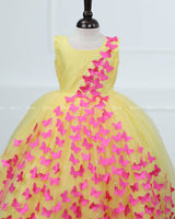 Yellow Partywear Frock with Spreaded Pink Butterflies.