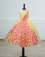 Yellow Partywear Frock with Spreaded Pink Butterflies.