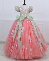 Peach Color Gown with White Flower Applique Detailing & Light Green Long Bow