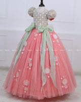 Peach Color Gown with White Flower Applique Detailing & Light Green Long Bow