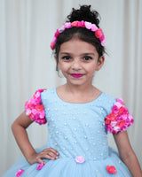 Light Baby Blue Gown with Pink shades Flower detailing and Pearl Work