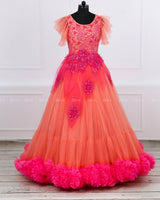 Coral and fuchsia pink designer gown with applique flowers and bead work detailing