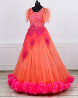 Coral and fuchsia pink designer gown with applique flowers and bead work detailing