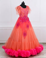 Coral and fuchsia pink designer gown with applique flowers and bead work detailing