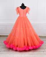 Coral and fuchsia pink designer gown with applique flowers and bead work detailing