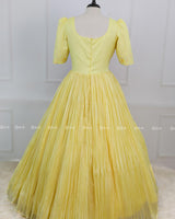 Butterfly and Floral Theme Yellow Gown with Attached Bows and Applique Works
