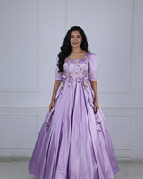 Butterfly and Floral Theme Lavender Gown with Attached Bows and Applique Works.