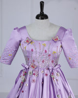 Butterfly and Floral Theme Lavender Gown with Attached Bows and Applique Works.