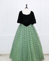 Dark Forest Green velvet sweetheart gown with flowy sleeves and a mint heart-mesh flare.