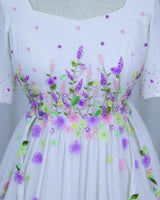 Georgette Elbow Sleeve Aari, 3D Floral & Attached Twirled Strips Embellished Floral Full Length Gown - White & Lavender(New)