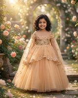 Peach-gold gown with 3D florals and soft tulle flare