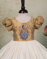 Elegant ethnic wear adorned with exquisite peacock handwork.