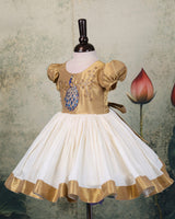 Elegant ethnic wear adorned with exquisite peacock handwork.