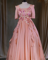 Butterfly and Floral Theme Peach Gown with Attached Bows and Applique Works.