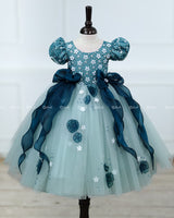 Powder Blue Gown with White Flower Applique Detailing & Teal Green Long Bow