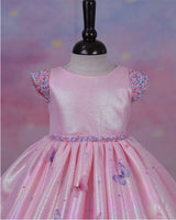 Elegant Baby Pink Frock Highlighted with beads and stones with Handcrafted Multicolour butterflies.