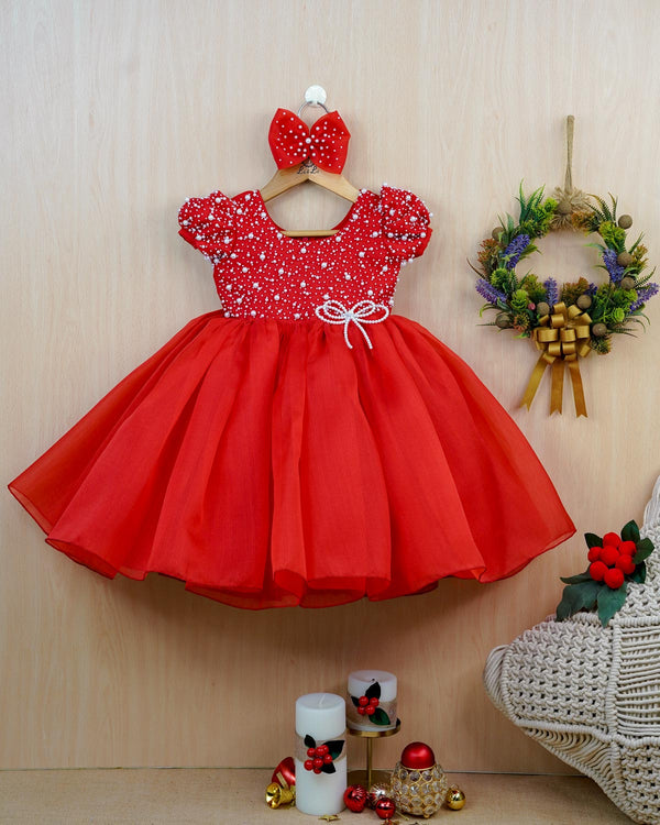 Red organza frock with white pearl embellishment