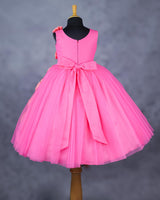 Pink and coral bow design gown
