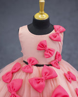 Peach and coral pink bow design gown