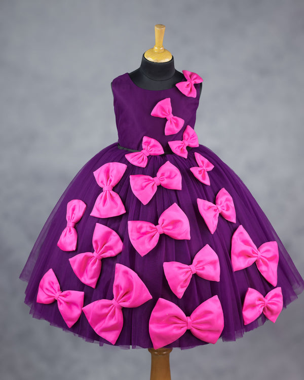 purple and pink bow design gown