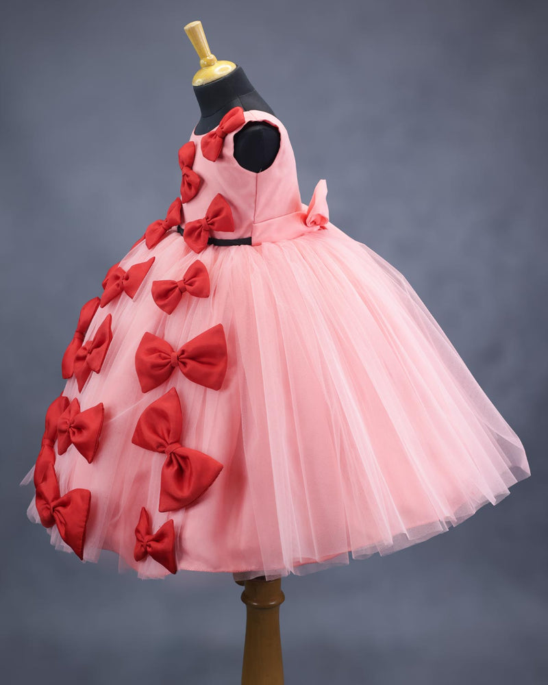 Coral and red bow design gown