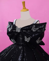 Black Sequence Panel Gown Highlighted with Handcrafted Silver Butterfly Patches.