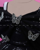 Black Sequence Panel Gown Highlighted with Handcrafted Silver Butterfly Patches.