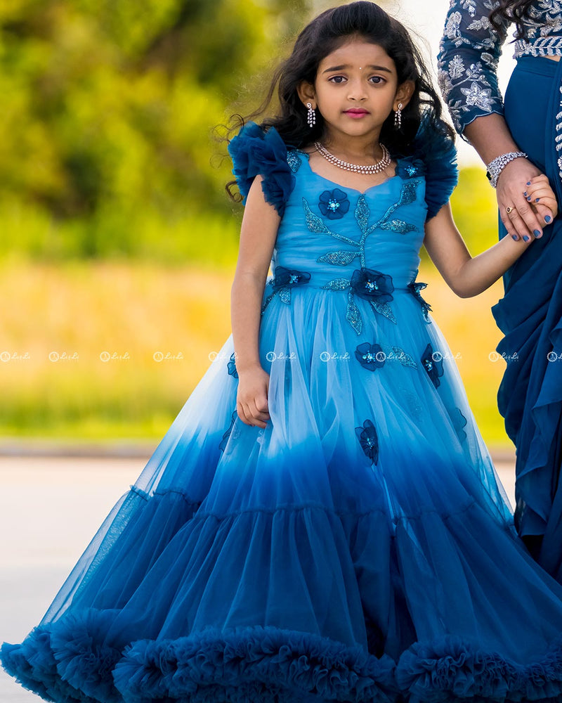 Sky blue and peacock blue Double Shade Couture Gown with Handcrafted Flowers and Leaves.