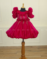 Wine Red Balloon Gown with Handcrafted Rose Embellishment.