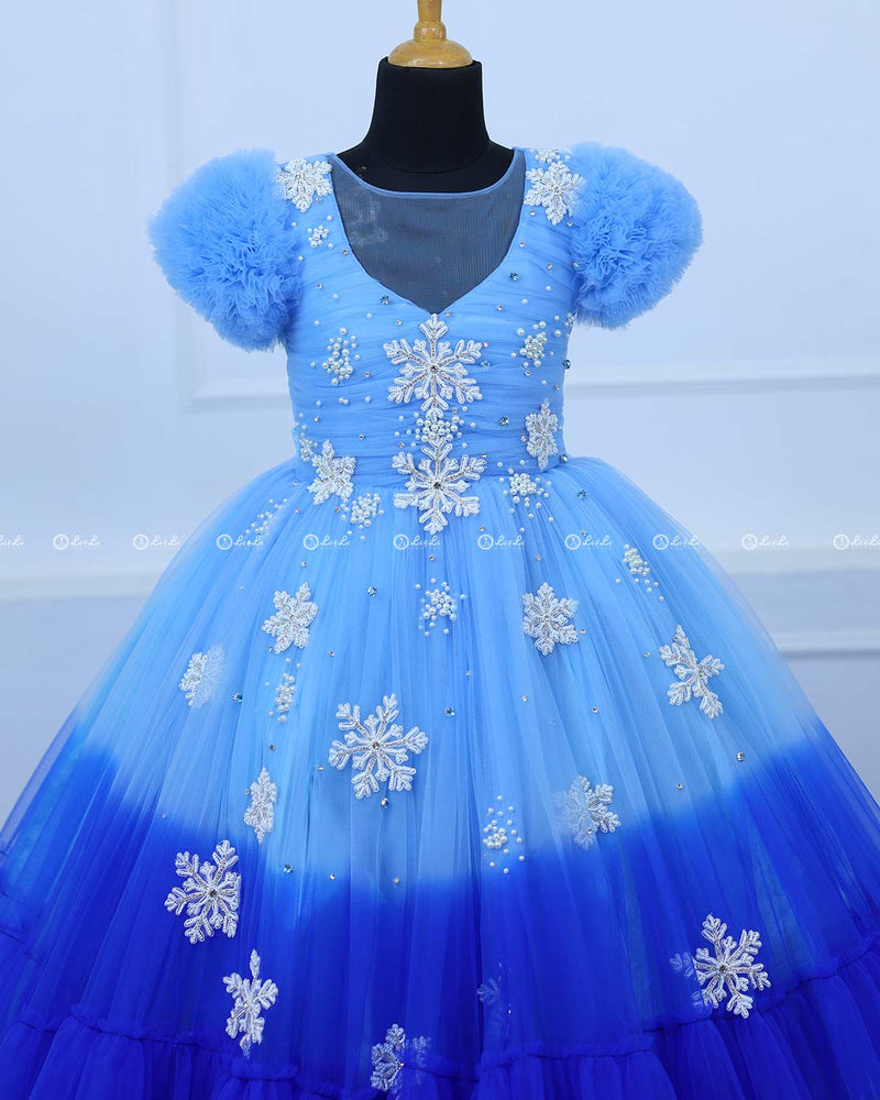 Snowflake theme light cobalt blue shade and dark royal blue layered frilled gown