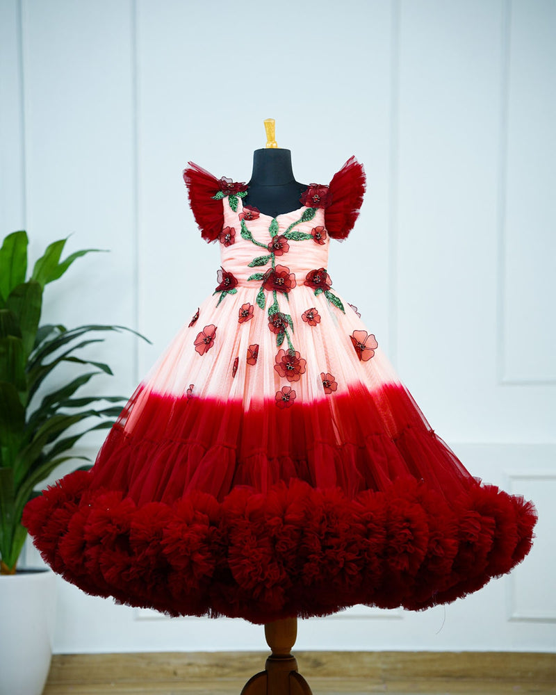 Maroon and peach double shade couturegown with frilled sleeves and handcrafted flowers and leaves