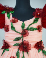 Maroon and peach double shade couturegown with frilled sleeves and handcrafted flowers and leaves