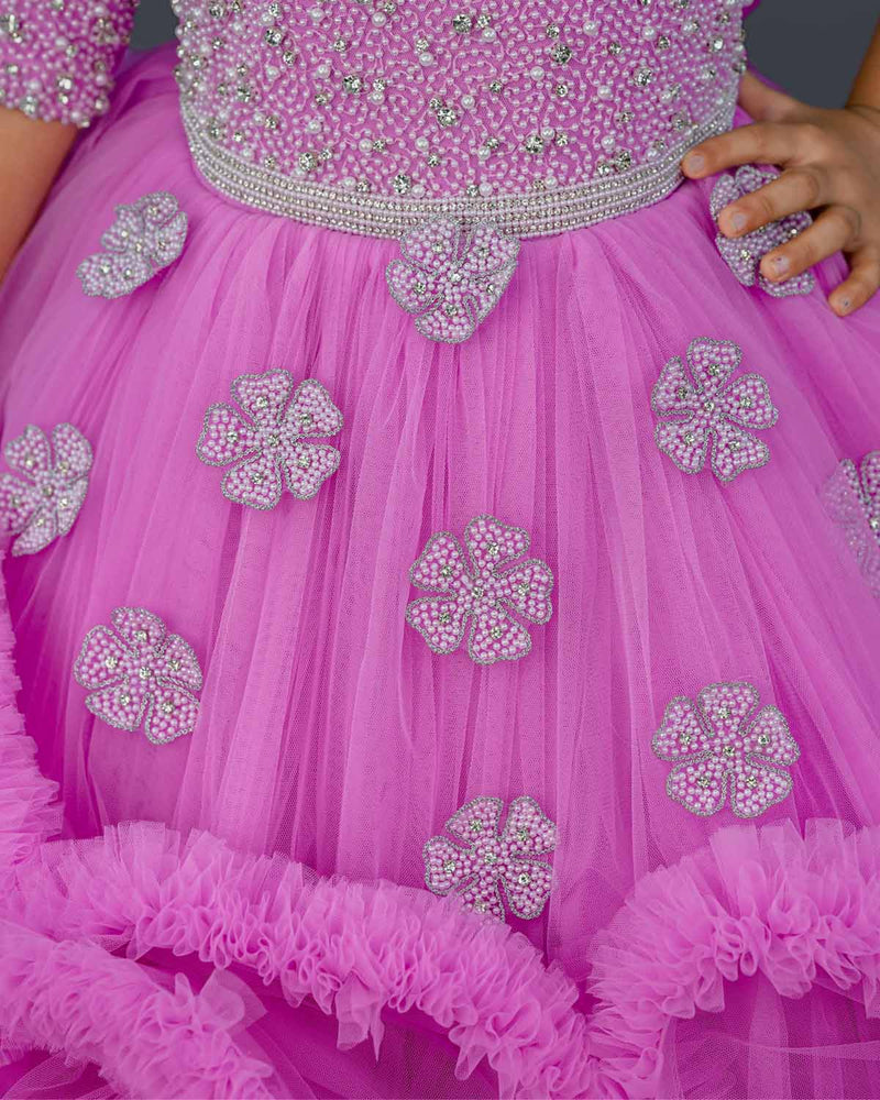 Pink lavender twirled gown with crystal and bead detailing