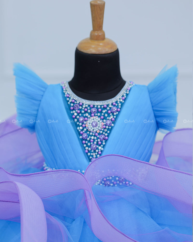 Sky Blue  and Lavender Twirled Gown with Rich White Bead Work.