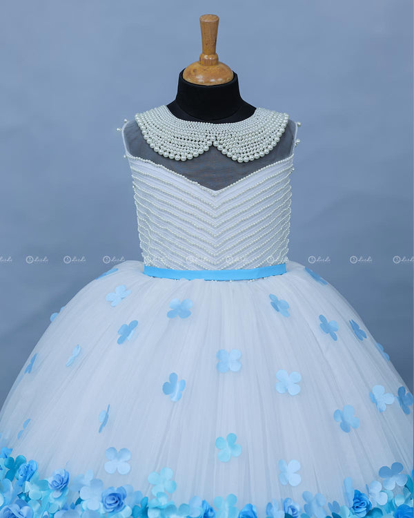 Blue color gradient rosette ball gown with pearl embellished yoke