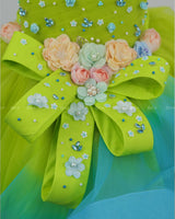 Lime Green & Turquoise Blue Twirled Gown with Multicolored Pastel Flower Embellished Yoke & Hcrafted Bow