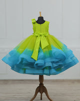 Lime Green & Turquoise Blue Twirled Gown with Multicolored Pastel Flower Embellished Yoke & Hcrafted Bow