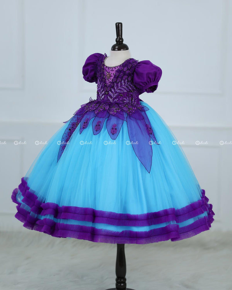 Purple and Sky Blue Part Wear Gown with Heavy and Crafted Yoke and Petal Detailing