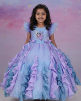 A dreamy lilac-blue fairy gown with butterfly details, side bows, and sparkling ruffles.
