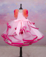 Dusty Peach Twirled Partywear Gown with Pink and Purple Small Flower