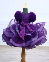 Dark grape purple twirled gown with rich golden bead work gown