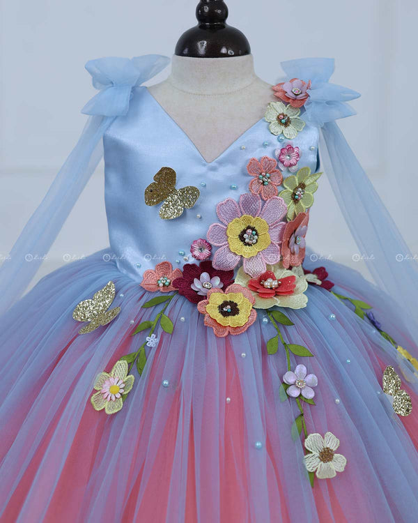 Flamingo Peach And Blue Tulle Dress With Flower Applique And Bow Tied Shoulder
