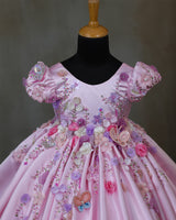 Elegant pink floral frock with puff sleeves and handworked butterfly