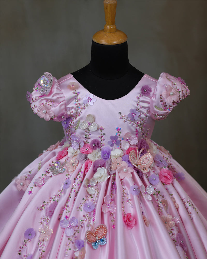 Elegant pink floral frock with puff sleeves and handworked butterfly